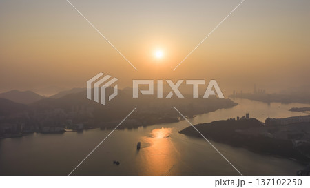 Golden Sunset Reflections Shimmer Beside Lei Yue Mun Coastline Feb 22 2026 137102250