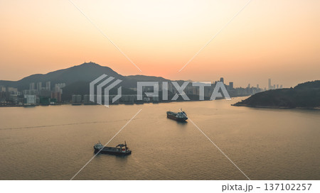 Golden Sunset Reflections Shimmer Beside Lei Yue Mun Coastline Feb 22 2026 137102257