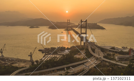 Dense Waterfront Skyline Overlooking Busy Harbour Beside Mountains Feb 21 2026 137102311