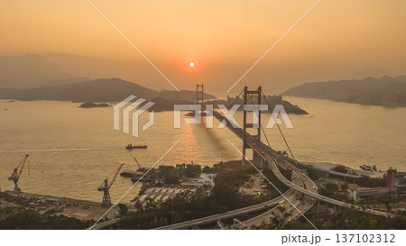 Dense Waterfront Skyline Overlooking Busy Harbour Beside Mountains Feb 21 2026 137102312