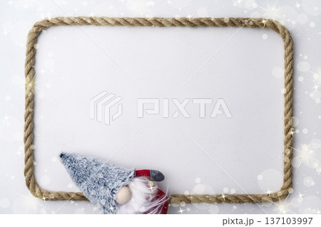 Festive winter background with Christmas gnome 137103997