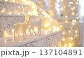 white stone wall, stairs decorated with lighted deer figures and christmas lights, decorated for the new year, minimalism, natural lighting, soft tones, close-up, m 137104891