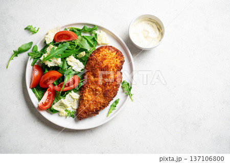 Breaded Chicken with vegetable salad Breaded Chicken with vegetable salad 137106800