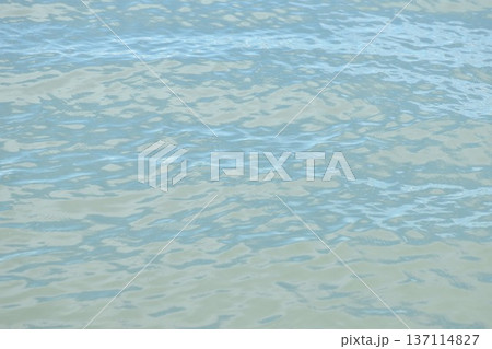 close up wave on green water surface on sea in sunny day background and texture of  137114827