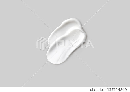 Swatch, smear of white cream. Face skin care, hand care, facial care. Isolated photo light gray background Swatch, smear of white cream. Face skin care, hand care, facial care. Isolated photo light gray background 137114849