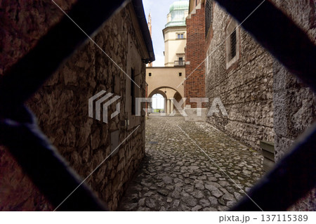 Krakow, Poland - June 16, 2023. Cozy courtyard Krakow, Poland - June 16, 2023. Cozy courtyard 137115389