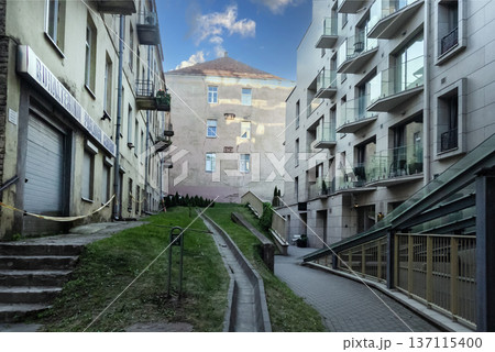 The courtyard of a historical and modern building in Vilnius The courtyard of a historical and modern building in Vilnius 137115400