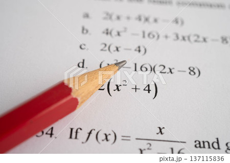 Pencil on mathematic formula exercise test paper in education school. 137115836