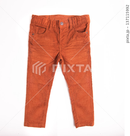 Pants for a boy of orange on a white isolated background 137115992
