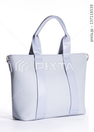 Women's blue leather bag on a white background 137118539
