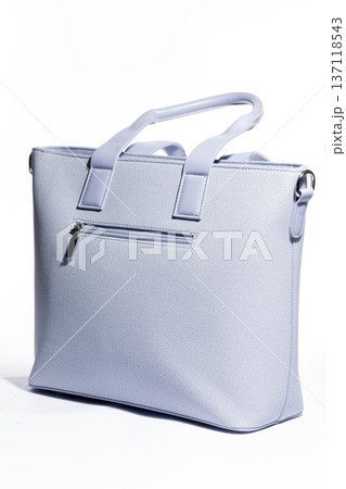 Women's blue leather bag on a white background 137118543