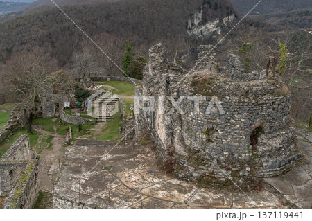 Ancient Anacopia fortress ruins with stone walls and arches overlooking mountain landscape in Abkhazia, Historic architecture and archaeological site suitable for tourism promotion, heritage marketing Ancient Anacopia fortress ruins with stone walls and arches overlooking mountain landscape in Abkhazia, Historic architecture and archaeological site suitable for tourism promotion, heritage marketing 137119441