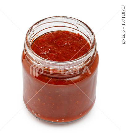 Glass jar filled with fresh red tomato salsa Glass jar filled with fresh red tomato salsa 137119717