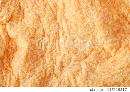 Orange fluffy textile surface creating abstract texture background 137119817