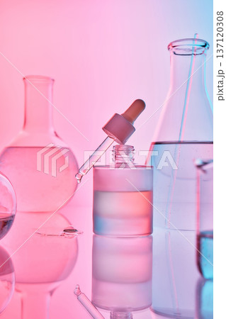 Skincare serum dropper bottle in scientific lab environment Skincare serum dropper bottle in scientific lab environment 137120308