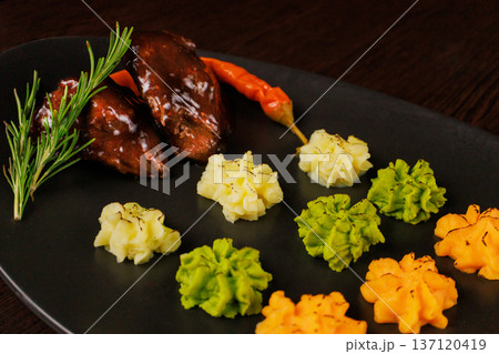 Fried meat on a plate with different sauces and Fried meat on a plate with different sauces and 137120419