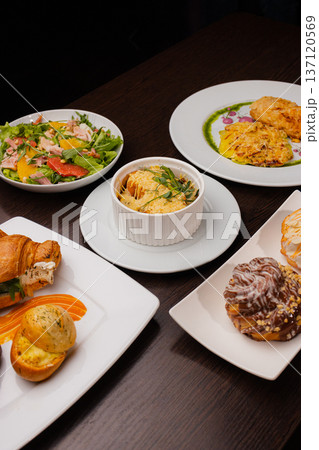 Several dishes for one person on the table Several dishes for one person on the table 137120569