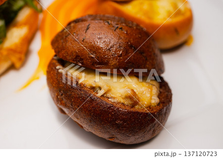 Croissant with salmon and stuffed buns on a plate Croissant with salmon and stuffed buns on a plate 137120723
