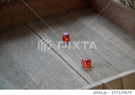 Dice for playing on a gaming table 137120874