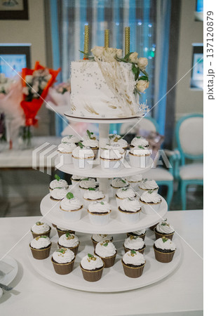 Beautiful wedding cake with several tiers 137120879