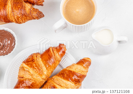 Top View Croissants with Coffee and Chocolate Spread on White Background Top View Croissants with Coffee and Chocolate Spread on White Background 137121108