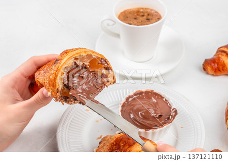 Croissant with Chocolate Cream and Coffee Breakfast Croissant with Chocolate Cream and Coffee Breakfast 137121110