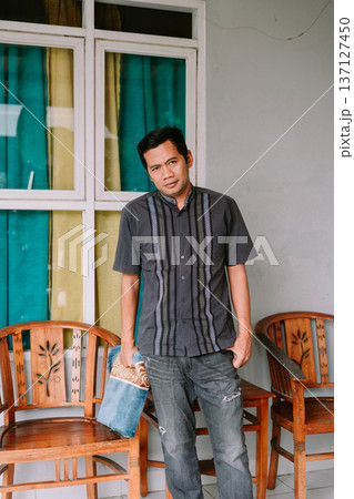 Portrait of Southeast Asian Man in Casual Traditional Shirt 137127450