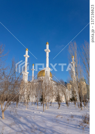 Panoramic view of snow-white with golden dome modern Nur-Astana Mosque, Astana, Kazakhstan. High quality photo Panoramic view of snow-white with golden dome modern Nur-Astana Mosque, Astana, Kazakhstan. High quality photo 137136623