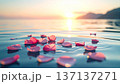 穏やかな海面に浮かぶピンクの花びらと清らかな波が織りなす海洋葬と追悼のための美しい祈りの風景 137137271