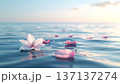 穏やかな海面に浮かぶピンクの花びらと清らかな波が織りなす海洋葬と追悼のための美しい祈りの風景 137137274