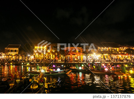 hoi an old town riverside view with lantern river boats in vietnam at night hoi an old town riverside view with lantern river boats in vietnam at night 137137876