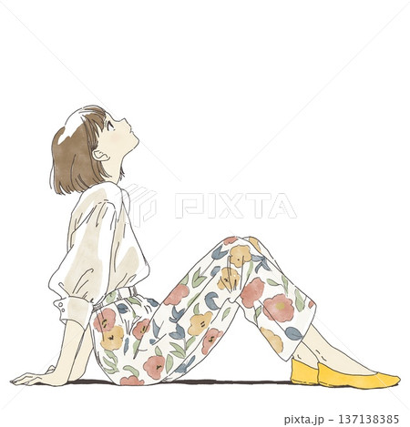 座って上を見上げる若い女性 137138385