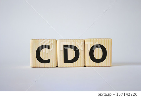 CDO - Collateralized Debt Obligation symbol. Wooden cubes with word CDO. Beautiful white background. Business and Collateralized Debt Obligation concept. Copy space. 137142220