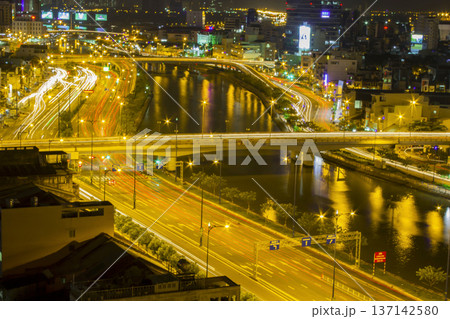Aerial View Of Vo Van Kiet Avenue And Tau Hu Canal In Ho Chi Minh City At Night, Vietnam. 137142580