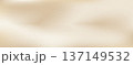 Gentle beige gradient with warm ivory and champagne tones. Subtle texture creates an elegant neutral backdrop, perfect for minimalist designs requiring sophisticated visual appeal. 137149532