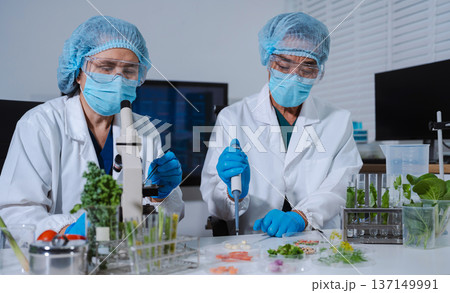 Scientists with research into natural medicine, natural skin care products, laboratories and development concepts. Scientists with research into natural medicine, natural skin care products, laboratories and development concepts. 137149991