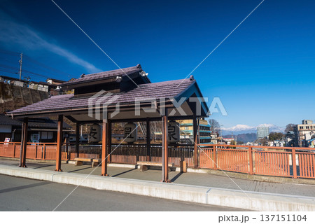 Shibu Onsen hot springs town bus stop with central alps, Nagano 137151104