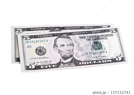 Two five dollars bill isolated on white. Stacked shot. Two five dollars bill isolated on white. Stacked shot. 137152741