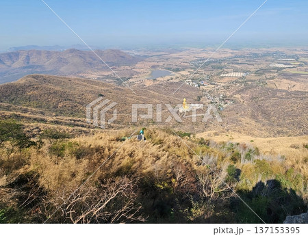 Panoramic View of Large Golden Buddha Statue on Mountain Peak in Thailand Panoramic View of Large Golden Buddha Statue on Mountain Peak in Thailand 137153395