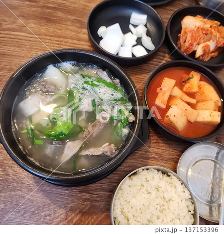 Traditional Korean Seolleongtang Beef Bone Soup served with Rice and Kimchi 137153396