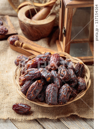 Dates fruits on a kitchen table. Dates fruits on a kitchen table. 137154164