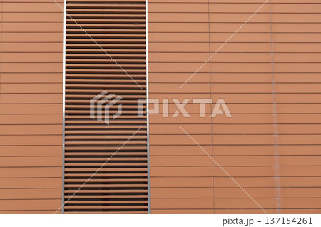 facade decorated by brown panels and stainless steel facade decorated by brown panels and stainless steel 137154261