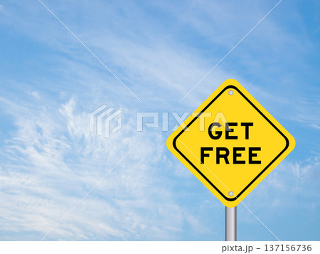Yellow transportation sign with word get free on blue color sky background Yellow transportation sign with word get free on blue color sky background 137156736