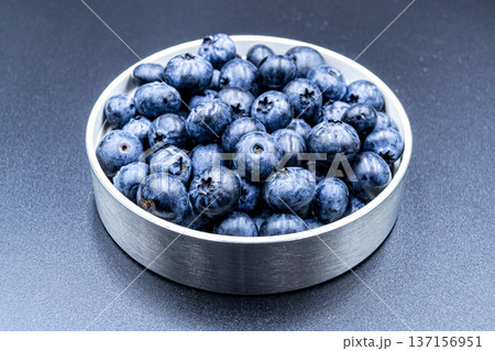 delicious summer blueberries on grocery market counter 137156951