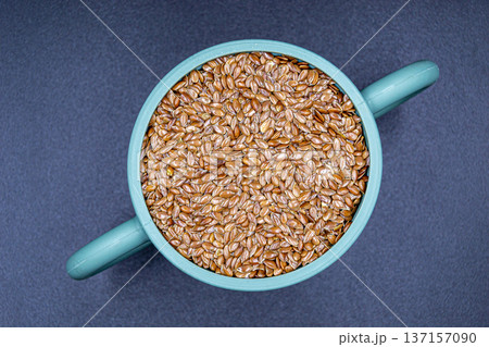 beautiful texture ripe of natural flax seeds on background beautiful texture ripe of natural flax seeds on background 137157090