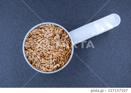 beautiful texture ripe of natural flax seeds on background beautiful texture ripe of natural flax seeds on background 137157107