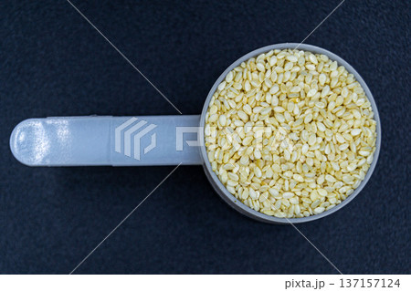 beautiful texture ripe of natural sesame seeds on background 137157124