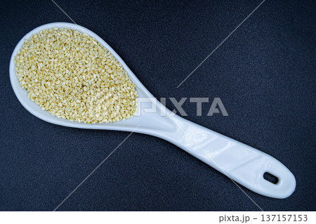 beautiful texture ripe of natural sesame seeds on background beautiful texture ripe of natural sesame seeds on background 137157153