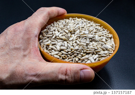 beautiful texture ripe of natural sunflower seeds on background beautiful texture ripe of natural sunflower seeds on background 137157187