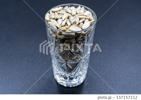beautiful texture ripe of natural sunflower seeds on background beautiful texture ripe of natural sunflower seeds on background 137157212